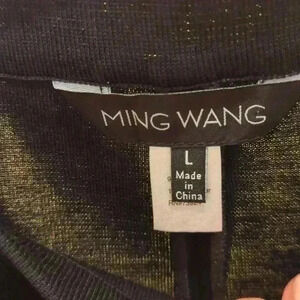 Beautiful NWT designer Ming Wang heavy knit black slacks.  Size large